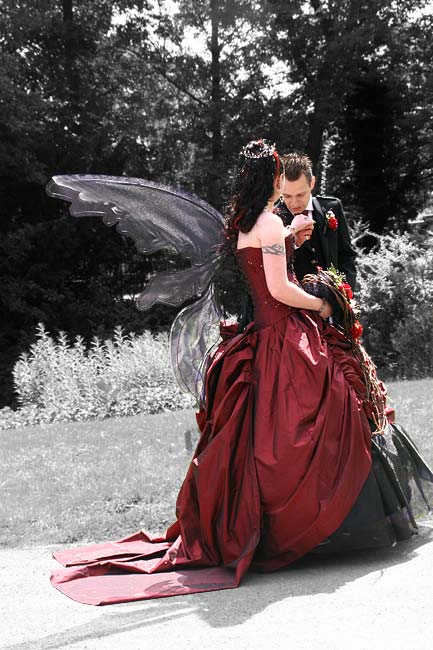It can be 50's inspired Gothic wedding dresses with ruffles at the 